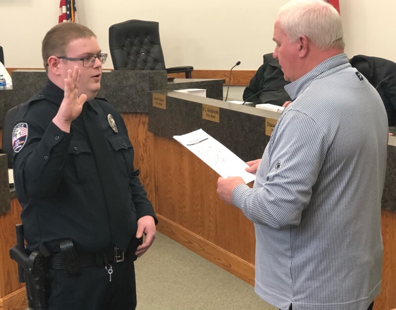 mayor weiss administers peace officers oath to officer luke mcclendon